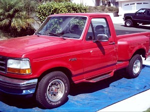 Before Picture of a Ford Pick Up Truck.  Picture shows an example of moderate oxidation on the paint. The truck’s paint is dull and lifeless.
